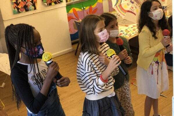 kidssinginginmasks Covid party for kids Kids practicing safe karaoke singing with masks due to COVID-19