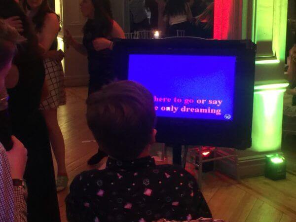New York City Bat Mitzvah Guest singing Karaoke at Manhattan Penthouse